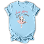 A light blue short-sleeve t-shirt with a graphic print of a cute ballerina cat in a pink tutu and the text 'Purrlina Ballerina' in pink and gray script.