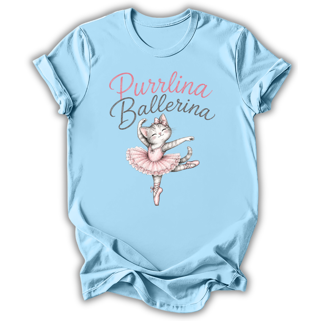 A light blue short-sleeve t-shirt with a graphic print of a cute ballerina cat in a pink tutu and the text 'Purrlina Ballerina' in pink and gray script.