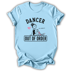 A light blue short-sleeve t-shirt with a graphic print on the front. The graphic features the word 'DANCER' in arched black letters above a stick-figure style dancer sitting with a broken heart and the phrase 'STILL MOVING UP' next to her.