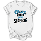 A white short-sleeve t-shirt with a graphic text print reading 'Okay, BUT DID you STRETCH?' in blue and black lettering, displayed on a clean white background.