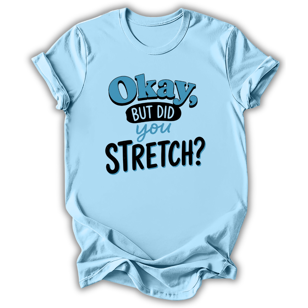 A light blue short-sleeve t-shirt with a humorous graphic print reading 'Okay, BUT DID you STRETCH?' in stylized blue and black lettering, shown against a plain white background.