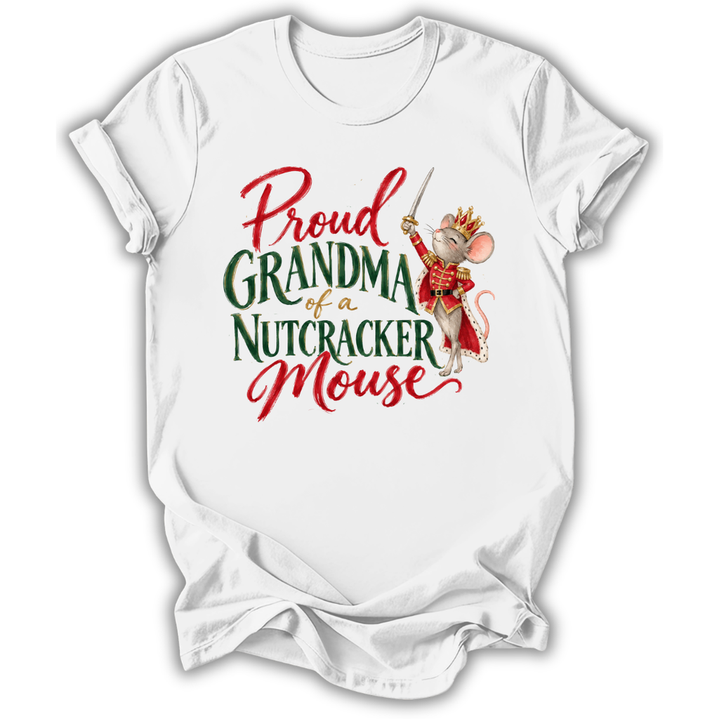 A white short-sleeve crewneck t-shirt with a graphic print on the front. The graphic features the text 'Proud GRANDMA of a NUTCRACKER Mouse' in red and green lettering, accompanied by an illustration of a nutcracker mouse wearing a red and gold costume and holding a sword.