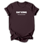 Brown short-sleeve t-shirt with white printed text reading 'RAT KING' and 'The Nutcracker' on the chest, displayed against a clean white background.