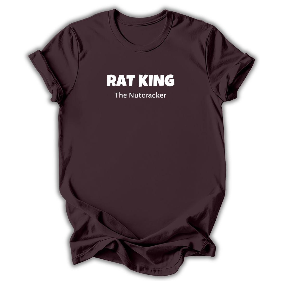 Brown short-sleeve t-shirt with white printed text reading 'RAT KING' and 'The Nutcracker' on the chest, displayed against a clean white background.