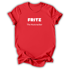 A red short-sleeve crewneck t-shirt with 'FRITZ The Nutcracker' printed in white on the chest, displayed against a clean white background.