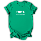 A bright green short-sleeve crewneck t-shirt with white printed text reading 'FRITZ' and 'The Nutcracker' on the chest, displayed against a clean white background.