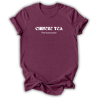 A maroon short-sleeve crewneck t-shirt with white text reading 'CHINESE TEA The Nutcracker' across the chest, displayed flat against a white background.