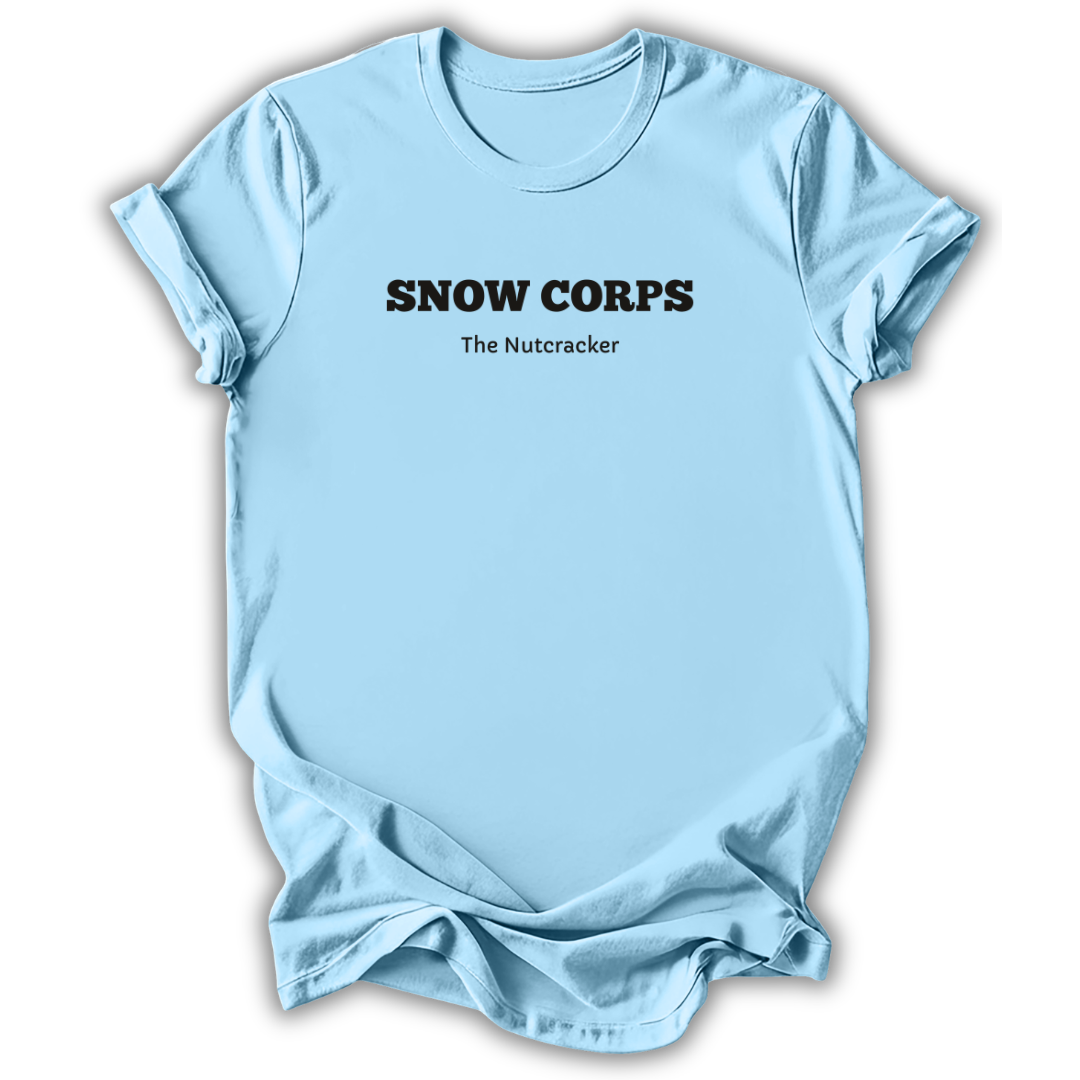 Light Blue short-sleeve t-shirt with black printed text reading 'SNOW CORPS' and 'The Nutcracker' underneath, displayed flat against a white background.