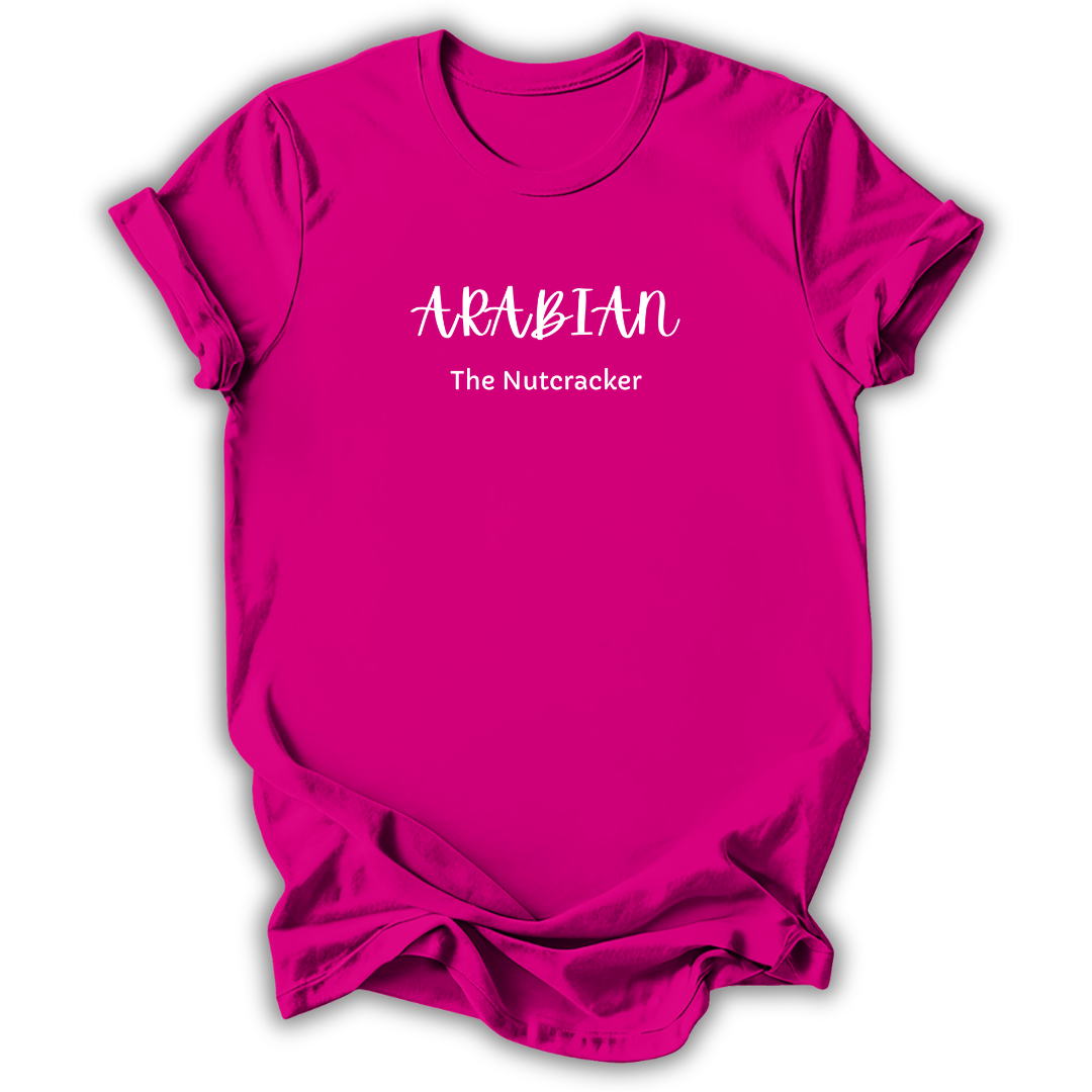 A bright pink short-sleeve t-shirt with white printed text reading 'ARABIAN The Nutcracker' on the chest, shown against a plain white background.