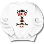 A white crewneck sweatshirt featuring a graphic print that reads 'PROUD MOM OF A Nutcracker RAT' in black and red lettering, with an illustration of a nutcracker rat in the center.