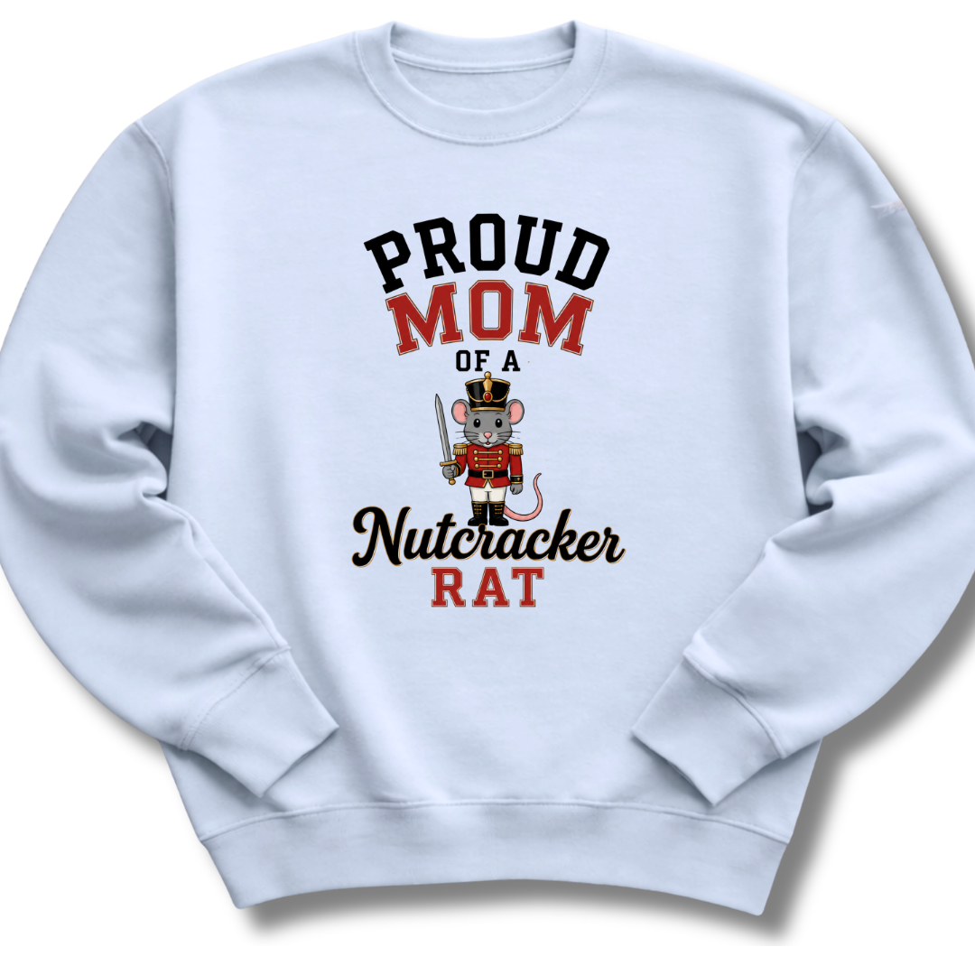 A light blue crewneck sweatshirt with a graphic print that reads 'PROUD MOM OF A Nutcracker RAT' in black and red lettering, featuring a cartoon nutcracker rat holding a sword.