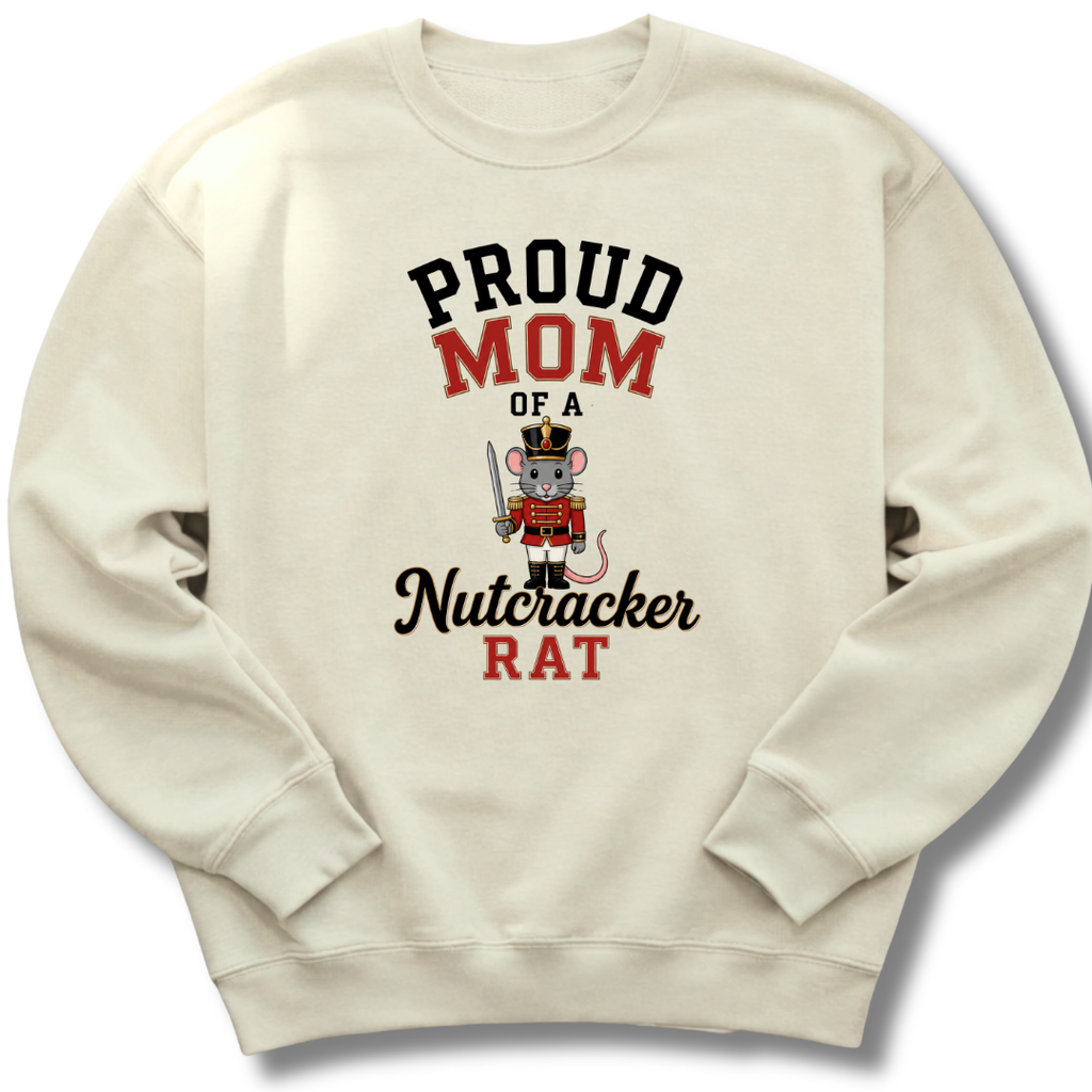 An off-white crewneck sweatshirt featuring a graphic print that reads 'PROUD MOM OF A Nutcracker RAT' with an illustration of a nutcracker mouse.