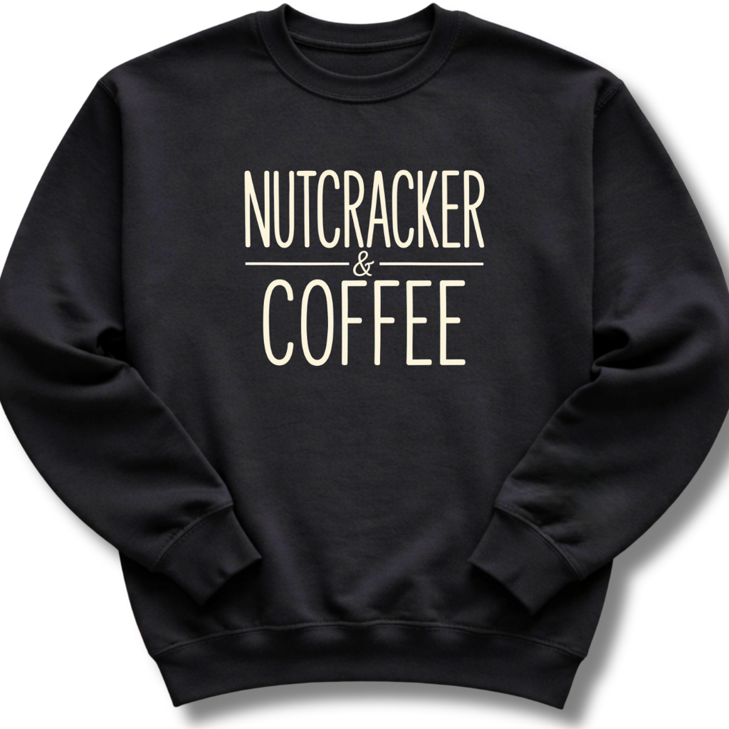 A black crewneck sweatshirt with the words 'NUTCRACKER & COFFEE' printed in a beige serif font on the chest, displayed against a plain white background.