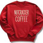 A red crewneck sweatshirt with the words 'NUTCRACKER & COFFEE' printed in white across the chest, displayed on a clean white background.