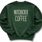 A dark green crewneck sweatshirt with the words 'NUTCRACKER & COFFEE' printed in a cream-colored serif font on the chest, displayed against a clean white background.