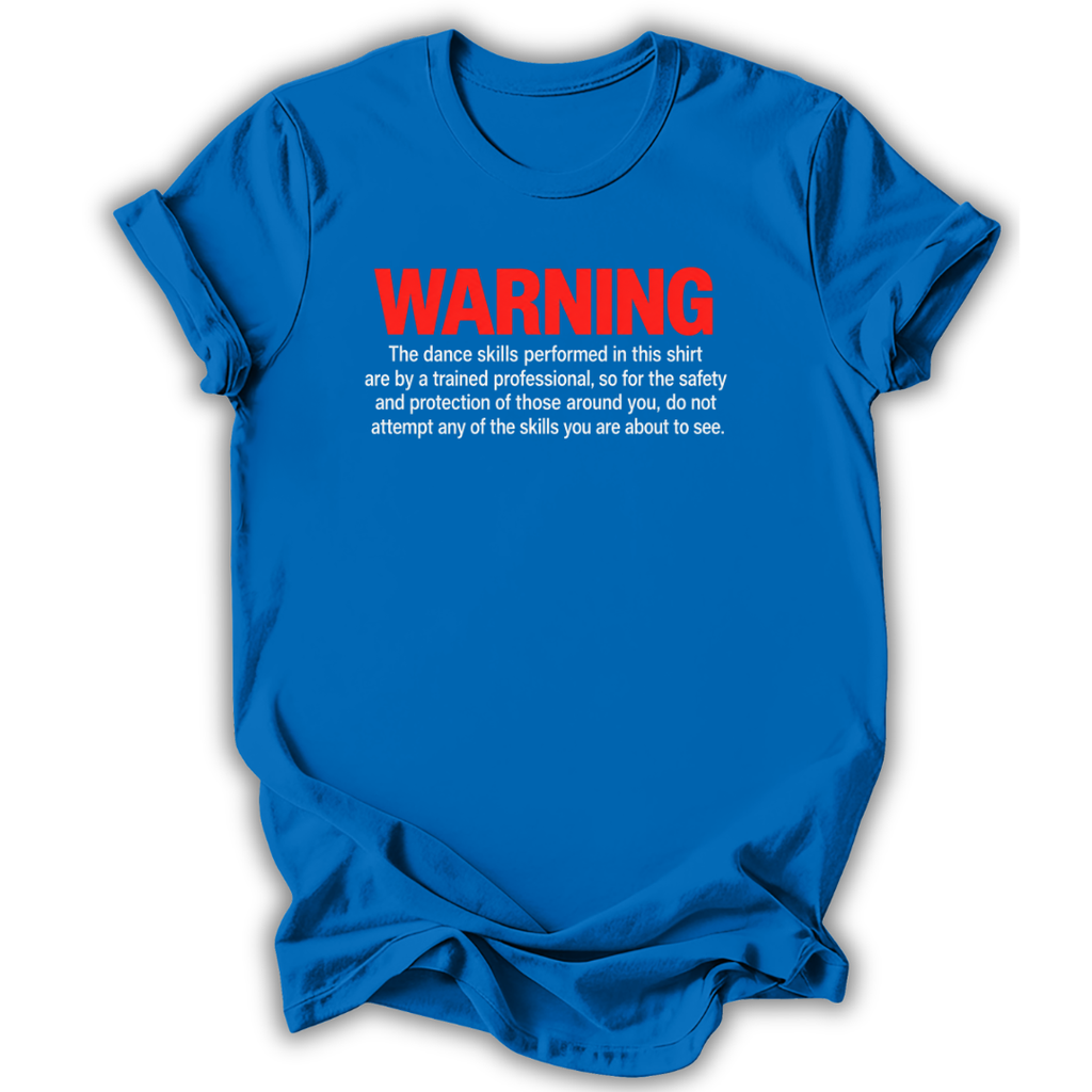 A bright blue short-sleeve t-shirt with a humorous warning printed on the chest. The text reads 'WARNING' in bold red letters, followed by smaller white text explaining that the dance skills shown are performed by a trained professional and should not be attempted unsupervised.
