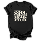 Black short-sleeve crewneck t-shirt with a cream-colored retro graphic that reads 'PROUD MEMBER COOL NUTCRACKER MOMS CLUB' and 'EMBRACING CHANGE, LEADING WITH LOVE.'.
