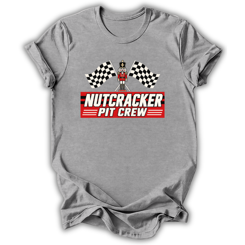 Gray short-sleeve t-shirt with a 'Nutcracker Pit Crew' graphic on the chest, featuring a race flag checkered pattern and a pit crew character, displayed on a clean white background.