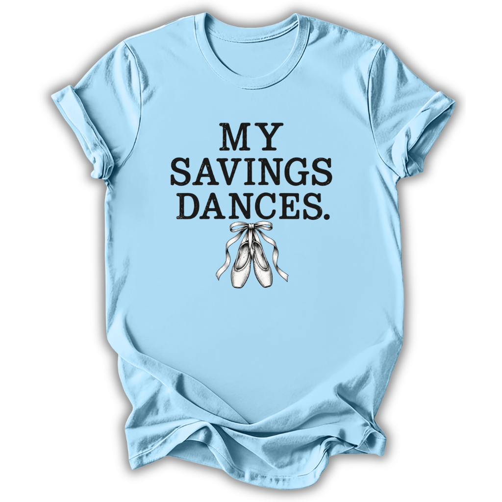 A light blue short-sleeve t-shirt with the text 'MY SAVINGS DANCES.' printed in black block letters above an illustration of white ballet slippers, shown on a white background.