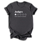 A dark charcoal gray t-shirt with a white graphic print on the front. The graphic reads 'Judges' above a one-out-of-five star rating system, with only one star filled in and the text 'awful, would not recommend.