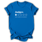 A bright blue short-sleeve t-shirt with a white graphic print on the front. The graphic features the word 'Judges' above a one-out-of-five star rating system, with only the first star filled in, and the text 'awful, would not recommend.