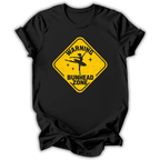Black short-sleeve t-shirt with a yellow diamond-shaped road sign graphic on the chest that reads 'WARNING BUNHEAD ZONE' with a silhouette of a ballerina.