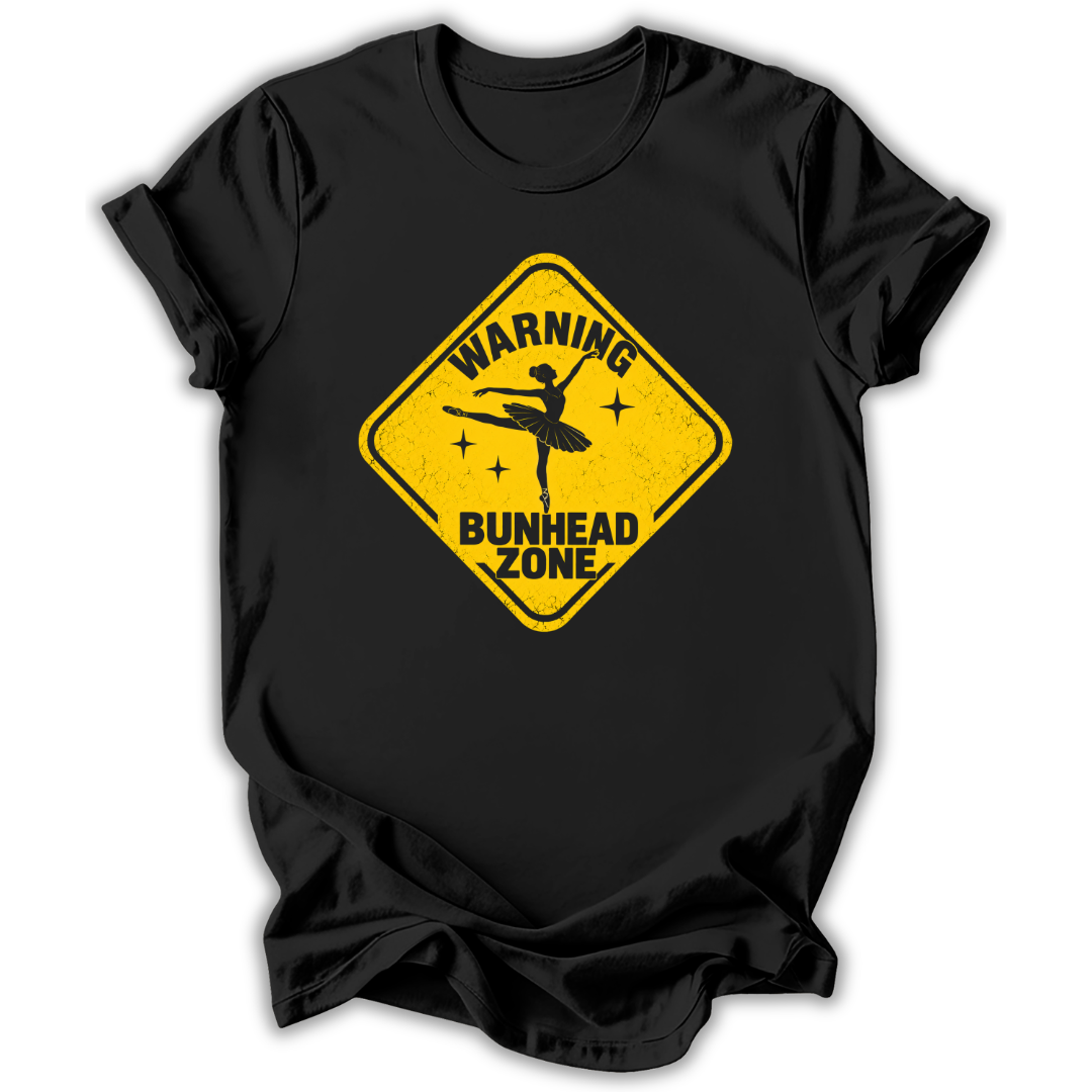 Black short-sleeve t-shirt with a yellow diamond-shaped road sign graphic on the chest that reads 'WARNING BUNHEAD ZONE' with a silhouette of a ballerina.