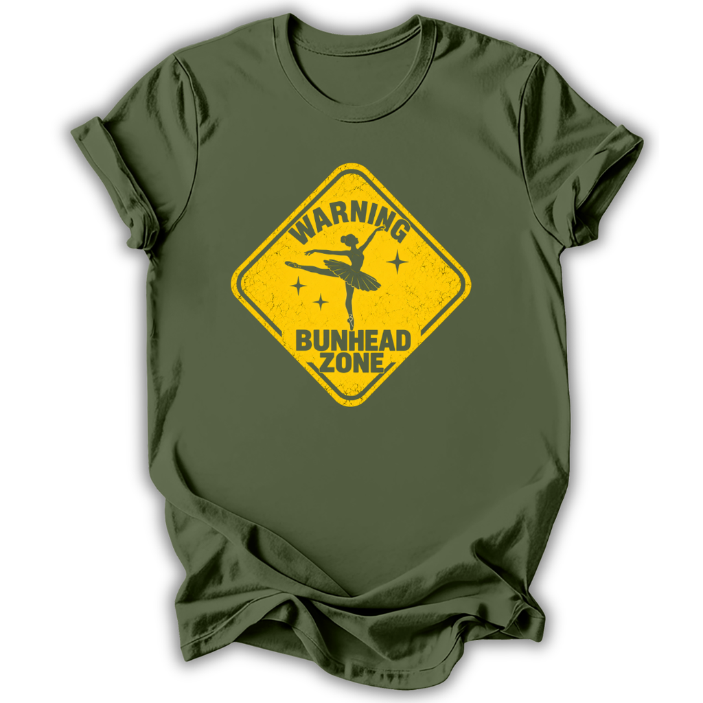 An olive green short-sleeve t-shirt with a yellow diamond-shaped road sign graphic on the chest that reads 'WARNING BUNHEAD ZONE' with a silhouette of a ballerina.