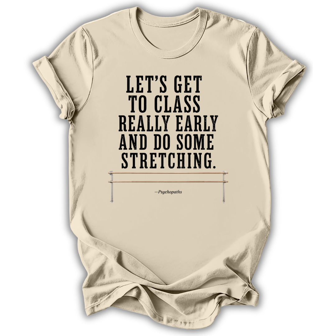 A beige graphic t-shirt featuring a black printed quote from Hippocrates: 'LET'S GET TO CLASS REALLY EARLY AND DO SOME STRETCHING.' above a simple barbell illustration, shown on a white background.