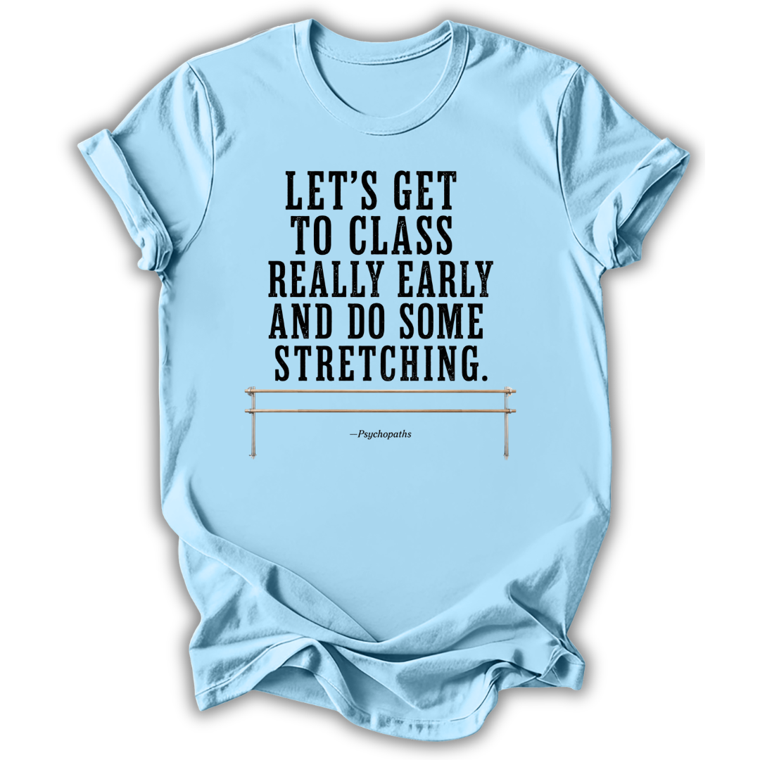 A light blue short-sleeve t-shirt with a black printed quote on the front that reads 'LET'S GET TO CLASS REALLY EARLY AND DO SOME STRETCHING.' Below the quote is a small illustration of a stretching bar and the attribution 'PippiLauten.