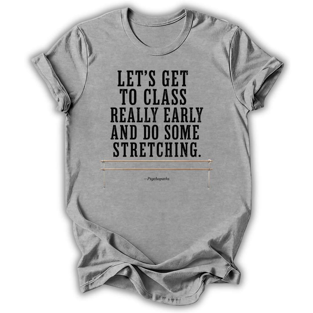 A heather gray short-sleeve t-shirt with a black printed text graphic that reads 'LET'S GET TO CLASS REALLY EARLY AND DO SOME STRETCHING.' with a small stretching bar illustration and the attribution '-Phippsarts' underneath, shown on a white background.