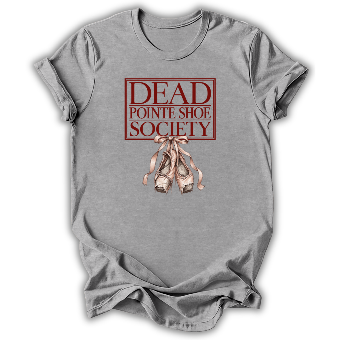 A heather gray short-sleeve t-shirt with a graphic print on the front. The graphic features a red rectangular border with the text 'DEAD POINTE SHOE SOCIETY' in red, above a pair of pinkish-beige pointe shoes tied with a ribbon.