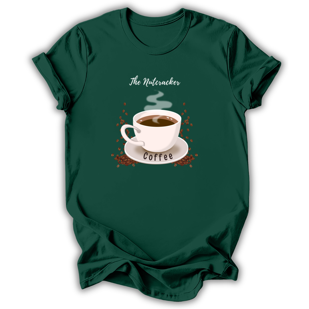 A dark green short-sleeve t-shirt with a graphic print of a white coffee cup on a saucer, surrounded by coffee beans and steam, with the text 'The Nutcracker' above and 'Coffee' below.