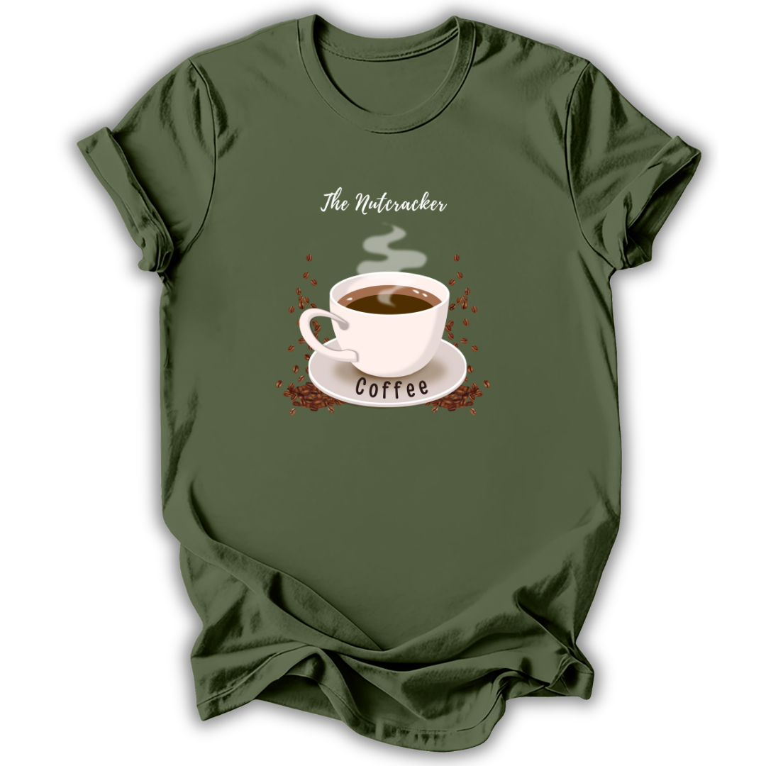 An olive green short-sleeve t-shirt with a graphic print of a white coffee cup on a saucer, surrounded by small red dots and the words 'The Nutcracker' and 'Coffee'.