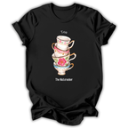 A black short-sleeve t-shirt with a graphic of a stack of four colorful teacups and the text 'Tea' above and 'The Nutcracker' below, displayed on a clean white background.