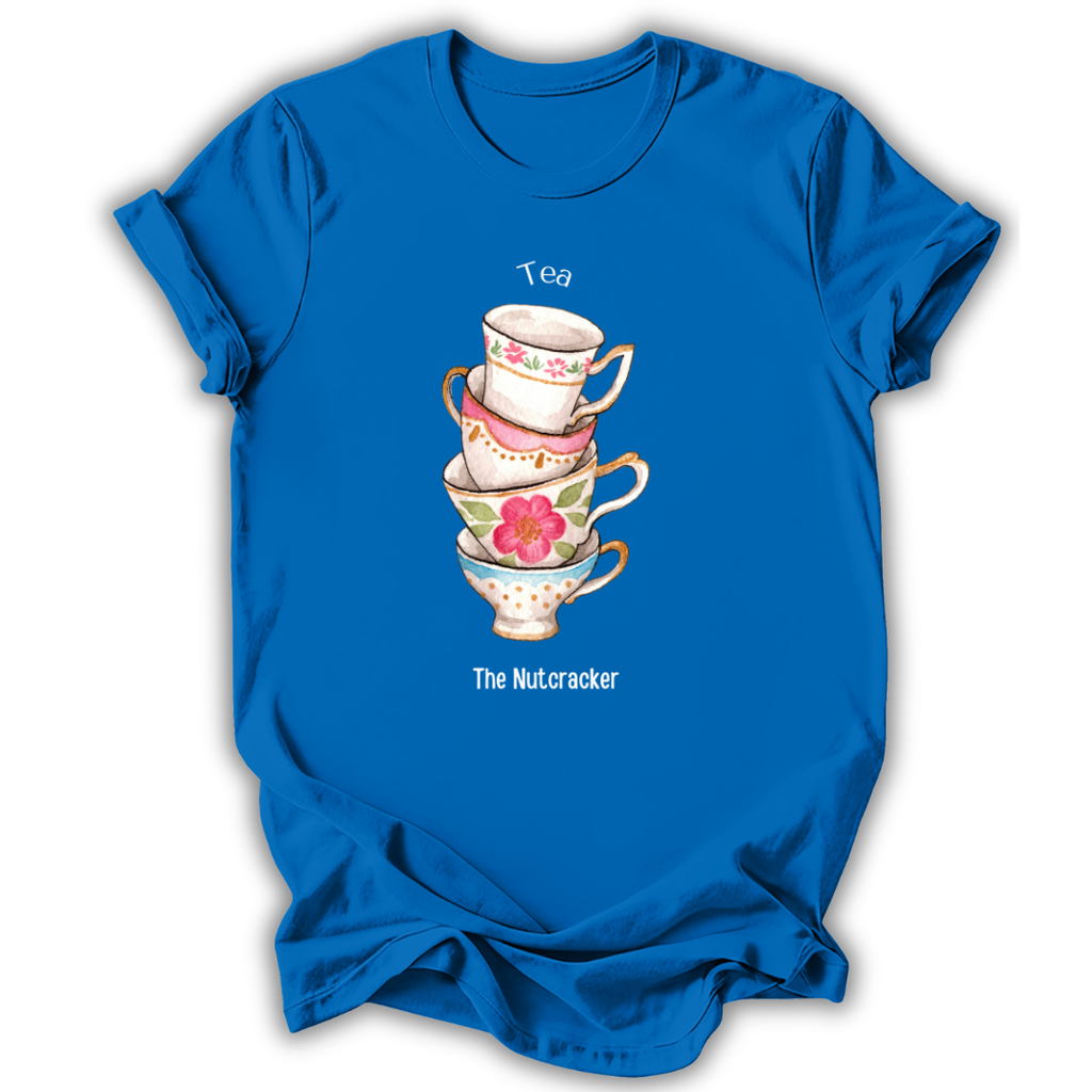 A bright blue short-sleeve t-shirt with a graphic of a stack of teacups and the words 'Tea' and 'The Nutcracker' printed on the front, displayed against a plain white background.