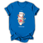 A bright blue short-sleeve t-shirt with a graphic of a stack of teacups and the words 'Tea' and 'The Nutcracker' printed on the front, displayed against a plain white background.