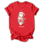 A red short-sleeve crewneck t-shirt with a graphic of stacked floral teacups and the words 'Tea' and 'The Nutcracker' printed on the front, shown against a plain white background.