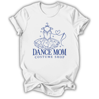 A white short-sleeve crewneck t-shirt with a blue graphic of a tutu dress on a hanger and the text 'DANCE MOM COSTUME SHOP' printed on the front, displayed against a clean white background.