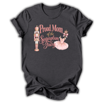 A dark charcoal gray short-sleeve t-shirt with a graphic print on the front. The graphic features a pink nutcracker, a pink tutu, and the text 'Proud Mom of the Sugarplum Fairy' in pink and gold lettering, displayed against a clean white background.