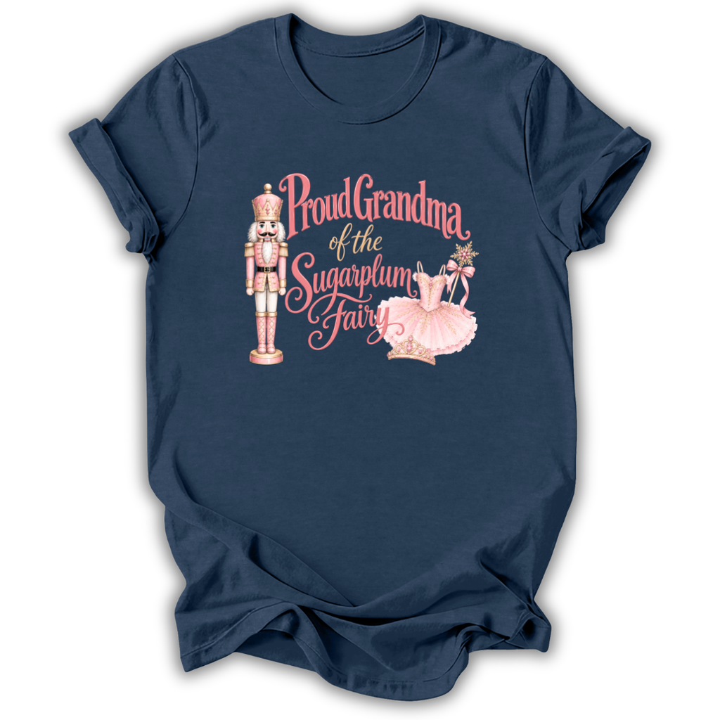 A navy blue short-sleeve t-shirt with a graphic print on the front. The graphic features a pink and gold nutcracker, a pink ballerina, and the text 'Proud Grandma of the Sugarplum Fairy' in pink and gold script.