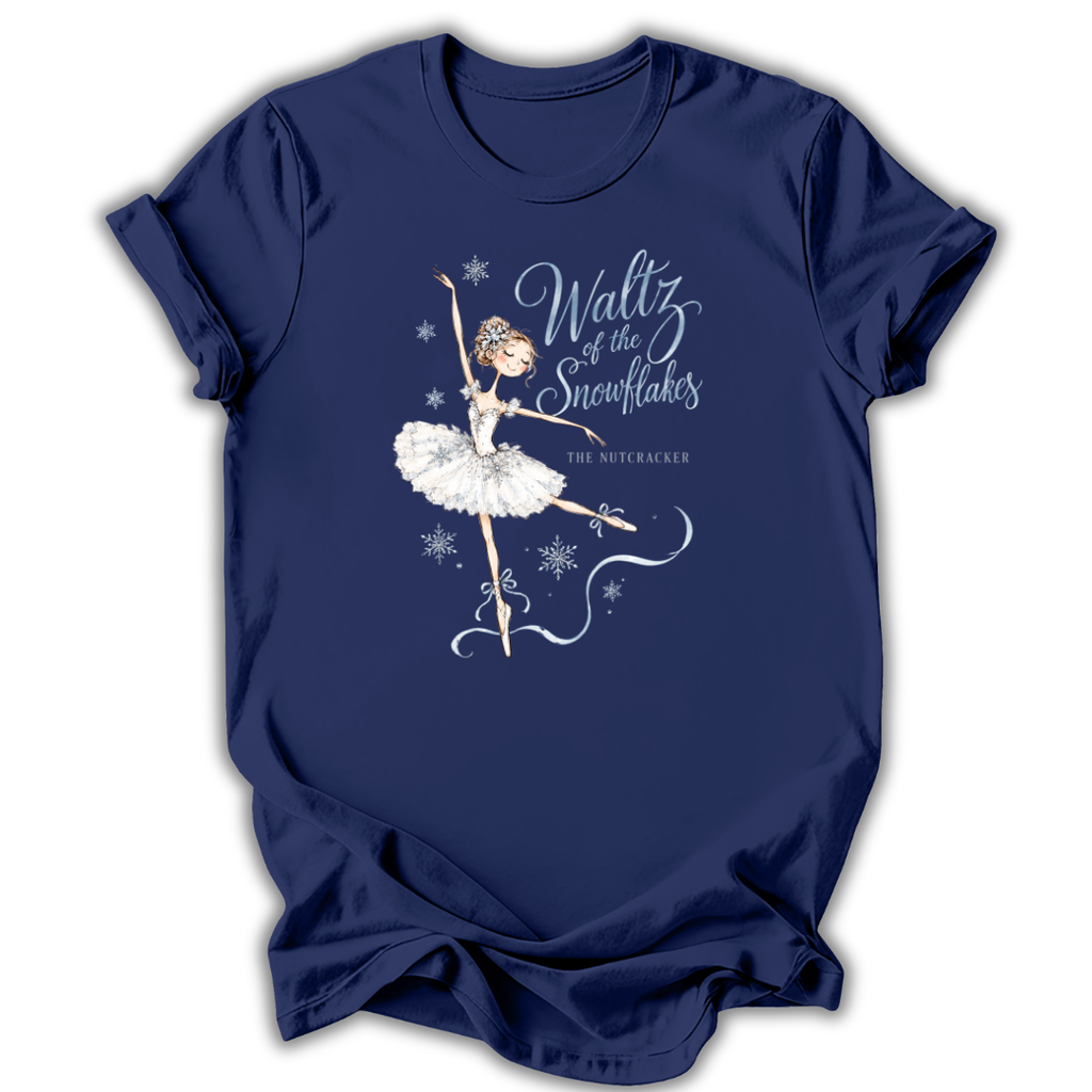 A navy blue short-sleeve t-shirt with a graphic print of a ballerina and the text 'Waltz of the Snowflakes' and 'The Nutcracker' on the front, displayed against a white background.