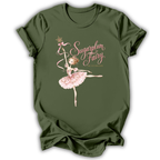 An olive green short-sleeve t-shirt with a graphic of a ballerina in a pink tutu holding a wand, next to the text 'Sugarpum Fairy' and 'The Watercolor' in pink and gold lettering.