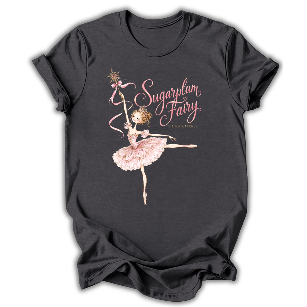 A dark plum-colored short-sleeve t-shirt with a graphic print of a ballerina in a pink tutu next to the text 'Waltz of the Flowers' and 'The North Shore'.