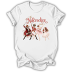 A white short-sleeve crewneck t-shirt featuring a vintage-style graphic of 'The Nutcracker' characters from the movie, including the nutcracker, soldier, ballerina, and fairy, with the text 'The Nutcracker 2020' in red and brown script.