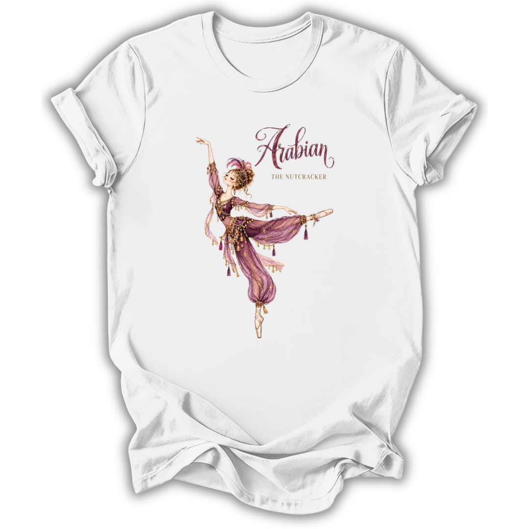 A white short-sleeve crewneck t-shirt featuring a graphic print of an Arabian-themed dancer in a purple and gold outfit, with the text 'Arabian THE NUTSKAID' printed above her.