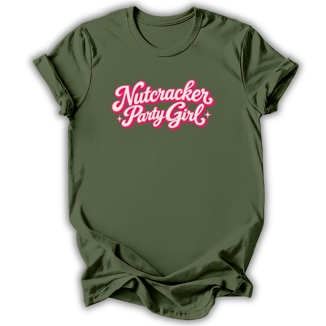 An olive green short-sleeve t-shirt with 'Nutcracker Party Girl' printed in a pink cursive font with white highlights across the chest, displayed on a clean white background.