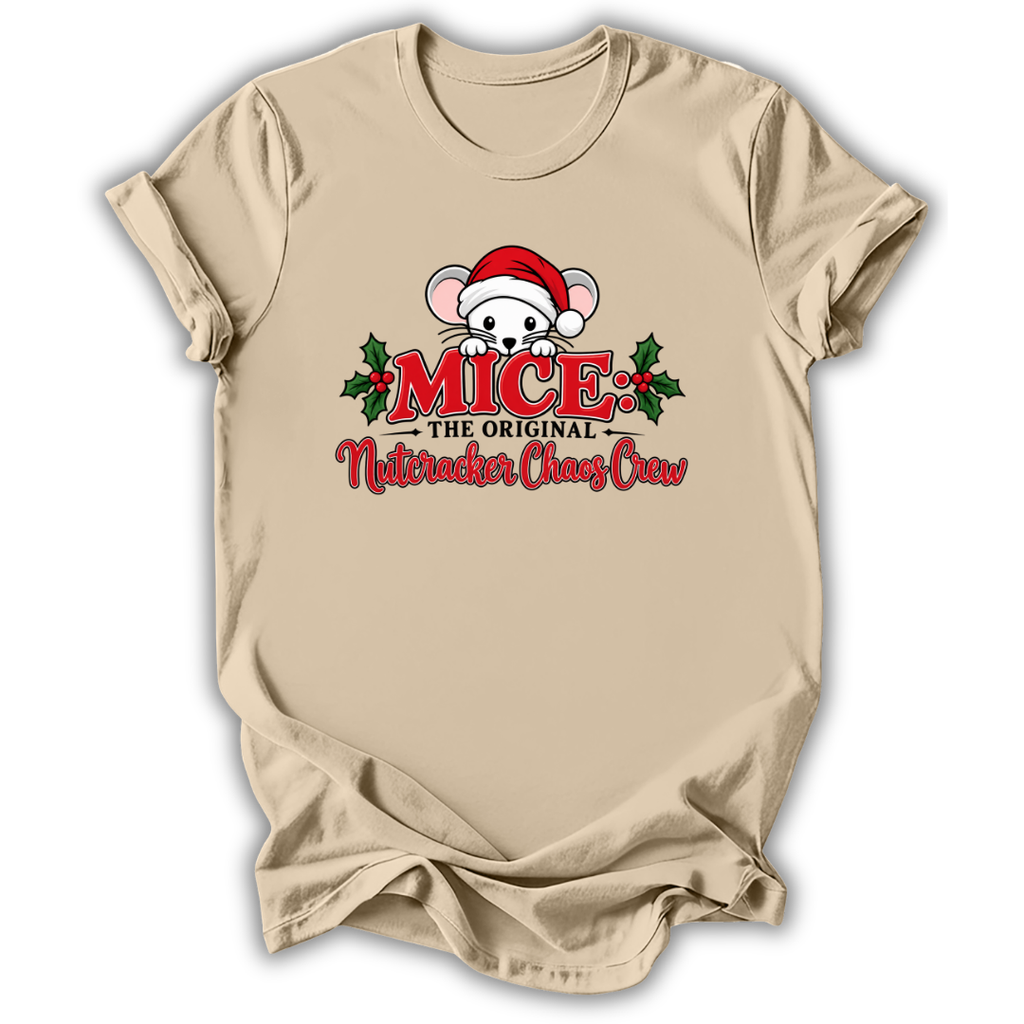 A beige short-sleeve t-shirt with a Christmas-themed graphic on the chest. The graphic features a cartoon mouse wearing a red Santa hat, flanked by green holly leaves and red text that reads 'MICE THE ORIGINAL Nutcracker Chaz Craz'.