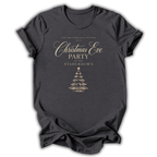 Dark gray short-sleeve t-shirt with a gold printed Christmas Eve party invitation design on the front, displayed against a clean white background.