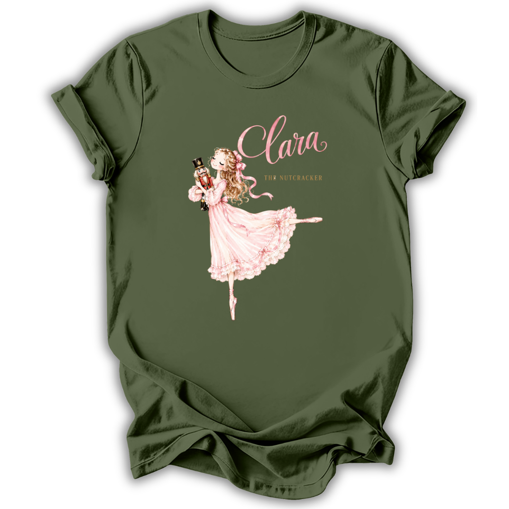 An olive green short-sleeve t-shirt with a graphic print of a ballerina in a pink dress holding a nutcracker, featuring the text 'Clara' and 'The Nutcracker'.